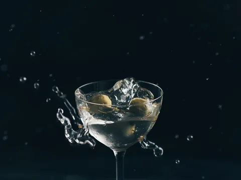 Martini glass surrounded by a splash of water at The Room